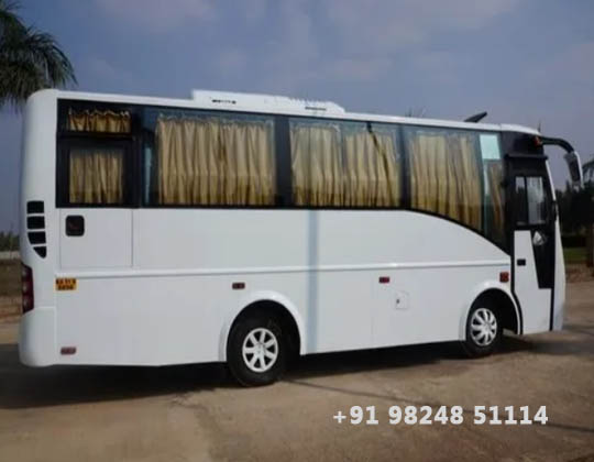 29 Seat Mini Bus travels Rental Services Rajkot - Ahmedabad - Booking Now - Airport - Hospital - Hotel - Toure Package
