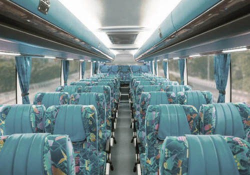 Travel Mini Bus - Corporate Rental - Monthli Rental Affordable And Reliable Service in Rajkot to Airport - Rajkot To Ahmedabad Airport Hire Bus Services